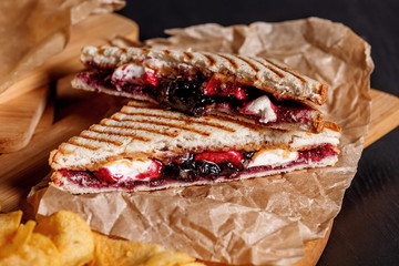Sandwich with homemade peanut butter, jam and marshmallow.