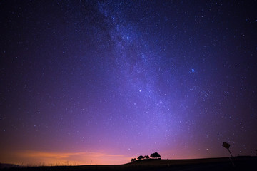 Shooting Stars Crossing in Milky Way and Starry Sky before Dawn.