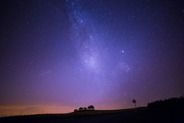 Shooting Stars Crossing in Milky Way and Starry Sky before Dawn. © Angelina Cecchetto