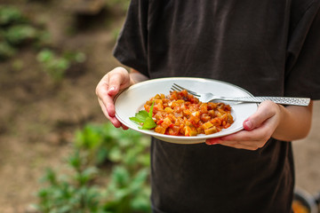 stewed vegetables - pumpkin, tomato, onions, carrots, zucchini, eggplant and more. . food background. top view