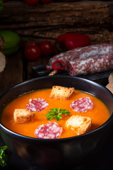 Hungarian paprika cream soup with spicy sausage