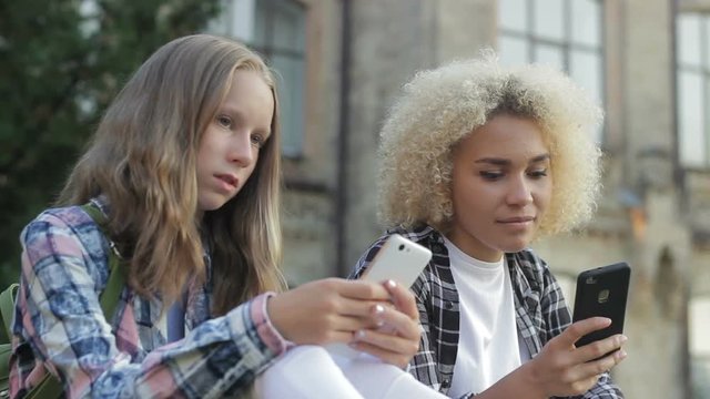 Modern middle-schoolers addicted to new modile phones, boredom, surfing internet