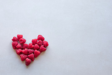 Heart shaped raspberries © luca