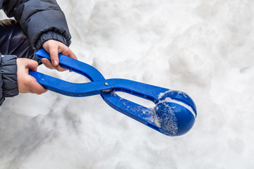 Toy snowball maker. Winter entertainment.