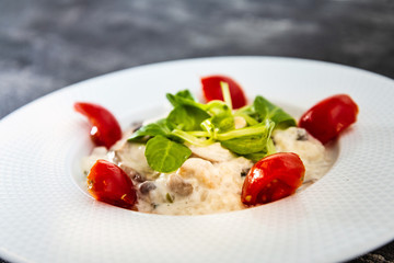 risotto with fresh cream, salted chicken, rehydrated ceps and mushrooms