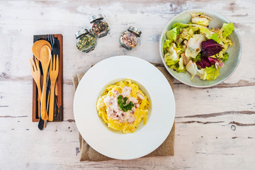 tasty pasta with roast ham on the table