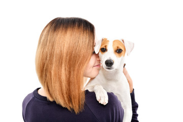 Portrait of a cute dog Jack Russell Terrier on the shoulder of its owner, isolated on white background