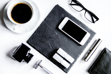 smartphone, electronic cigarette and men's accessories top view