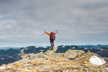 The man on the top of the mountain.