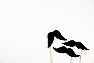 Movember concept. Annual event involving growing of moustache & beard during month in November to...