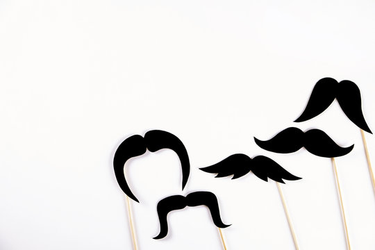 Movember concept. Annual event involving growing of moustache & beard during month in November to raise awareness of men's health issues and prostate cancer. Background, close up, copy space, flat lay
