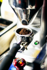 Fototapeta na wymiar making espresso coffee close up detail with modern machine