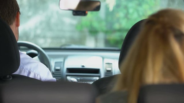 Taxi client paying driver, giving dollars and getting off car, transport service