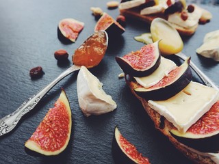                        Bruschetta with cheese, fresh figs, nuts and honey. Sandwiches with cheese,...