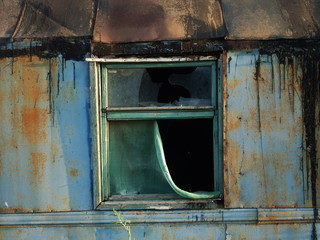 a window in an abandoned van