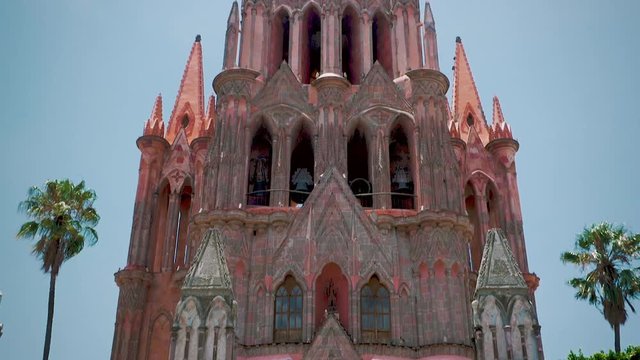 Parroquia pink sandstone church in San Miguel de Allende, Mexico - tilt up