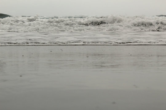 A close view of the sea undertow in the Almaciga black sand beach, in Tenerife, Canary