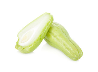 whole and half cut fresh Chayote on white background