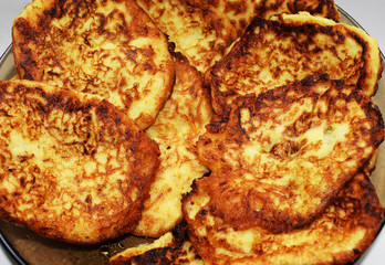 Lush pancakes for Breakfast. A rustic dish. High-calorie food.