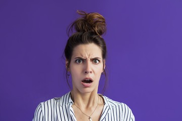 What? Interrogative face. Shock and bewilderment. Anger on the face of a woman. Emotionality,...