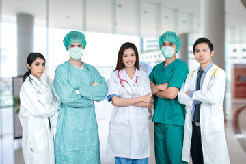 Group portrait of medical staff standing in hospital