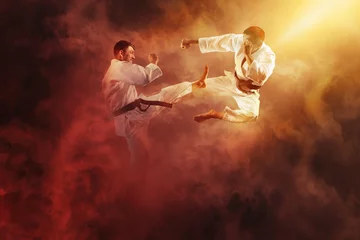 Fotobehang Twee mannelijke karategevechten © Andrey Burmakin