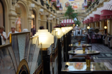 A number of lamps in the cafe shopping center.