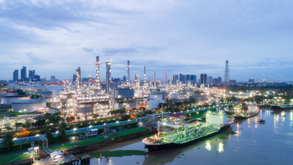 Oil refinery factory for energy or gas industry background.