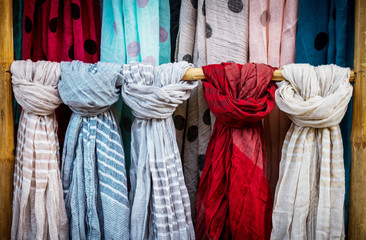 Fototapeta na wymiar Beautiful colorful scarves. Colors of textiles.