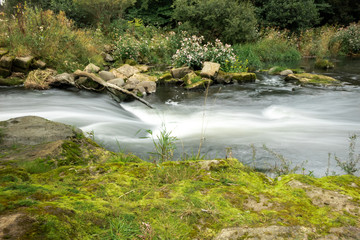 Fototapeta premium Water fall and rapids at the River Carron in Scotland