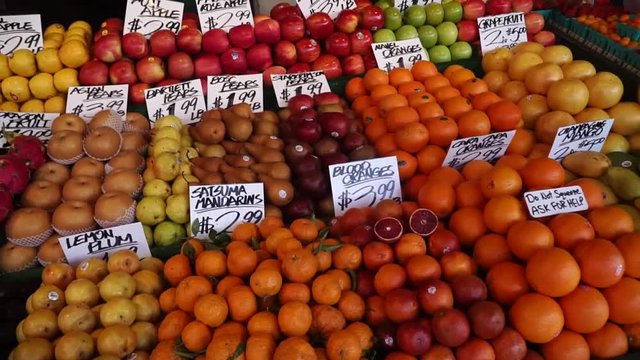 Delicious fruits and vegetables lie on the counter on the market