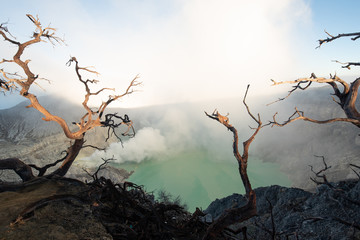 Kawah Ijen volcano complex is a group of composite volcanoes in the Banyuwangi Regency of East Java, Indonesia.Kawah Ijen at Sunrise. The most famous tourist attraction in Indonesia