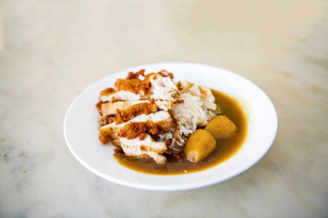 Fried chicken with curry delicious. meal of fried chicken food and the sweetness of curry with potatoes