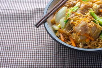 Close up of Fried instant noodles in Bowl.