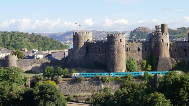 Train passing Conwy Castle Conwy Gwynedd Wales 