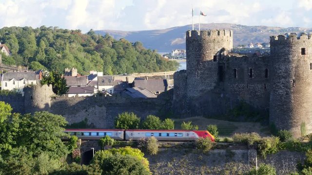 Train passing Conwy Castle Conwy Gwynedd Wales 