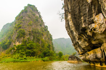 Beautiful lanscape with lake, river and stunning hills of the Trang An, Ninh Binh in Vietnam