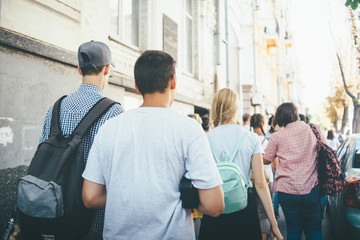 people are walking in the city street