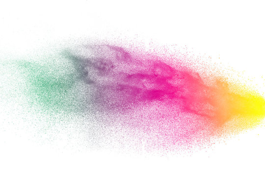 Multicolored particles explosion on white background. Colorful dust splatter on white background. © Pattadis