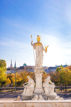 Picturesque autumn view on old town of Vienna from the historic building of the austrian parliament. Sculpture of Pallas Athene Fountain
