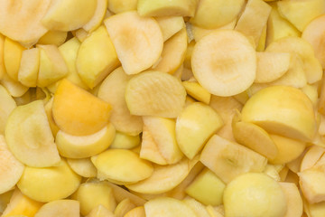 Yellow apples piece background. cut chopped organic apple grown without chemical treatments. Healthy fresh produce