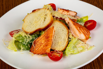 Caesar salad with salmon