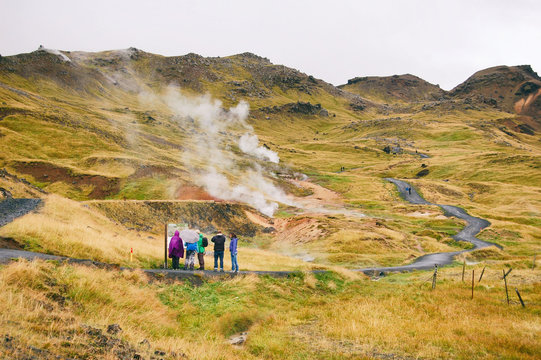 Tourist at the beginning of Reykjadalur valley path