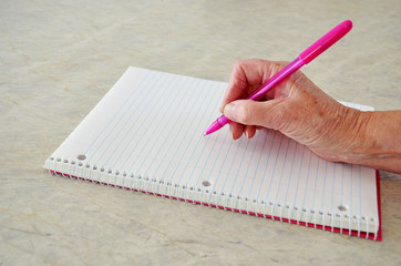 Elderly female hand writing