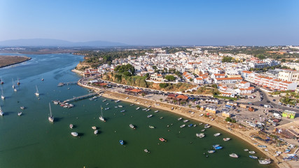 Naklejka na ściany i meble Aerial view of the village of Alvor, in the summer, in southern Portugal.