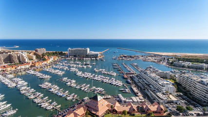 Fototapeta na wymiar Aerial view of the bay of the marina, with luxury yachts in Vilamoura.