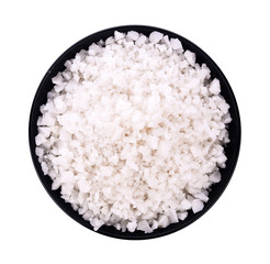 Sea salt in bowl on white background