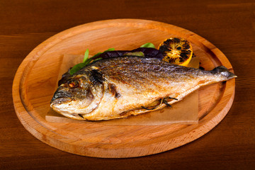 Grilled dorada with lemon