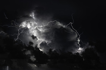 Lightning burst from within a cloud