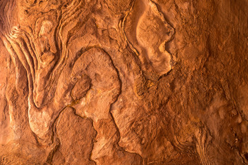 Wall texture at Petra, Jordan. Detail of the rock wall in the Tombs